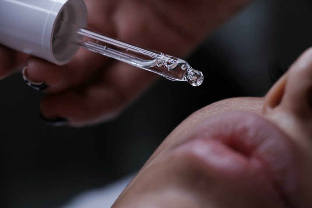 a close up of a person getting a botilage treatment
